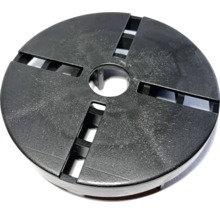 Rund täckplatta med central öppning och fyra spår