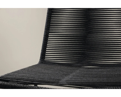 Detaljvy av en stol med sladdklädsel