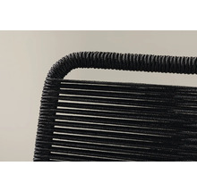 Detalj av en svart repstol.