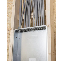 Installation av en elbox med rör i en träram