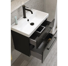 Tvättställ med två öppna lådor och armatur