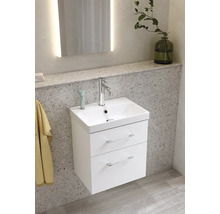 Badrumsscen med ett vitt tvättställsskåp med två lådor, ett handfat och en kran.