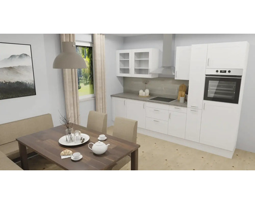 Ljust kök med matbord och bänk