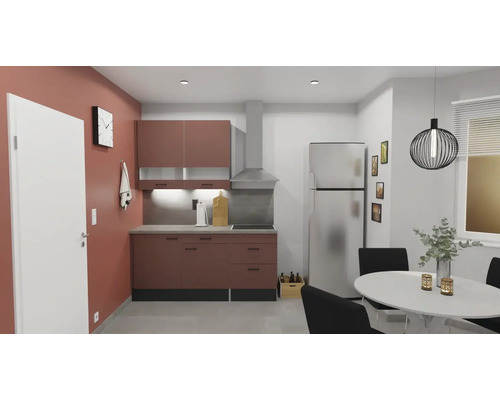 Ljust kök med köksskåp, köksfläkt, kylskåp och matbord med stolar.