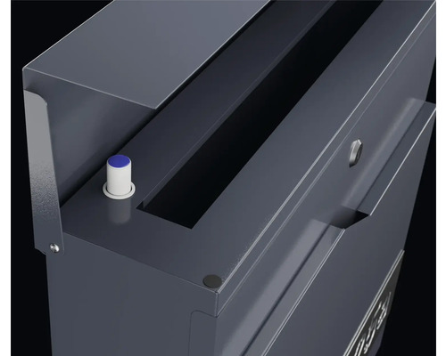 Detaljvy av en postlåda med inkast och ringknapp