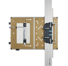 Wolfcraft Master Cut maskinbord med styrskena FKS 145 och brun arbetsplatta, sedd uppifrån.