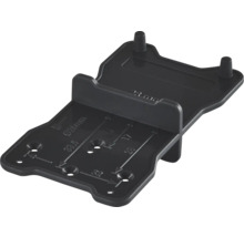 Svart borrmall och markeringsmall i plast för möbelmontering med millimetermarkeringar.