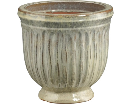 Keramisk blomkruka med dekorativ spårstruktur