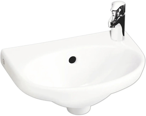 Keramisk handfat med armatur för badrummet