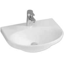 Tvättställ i keramik med blandare