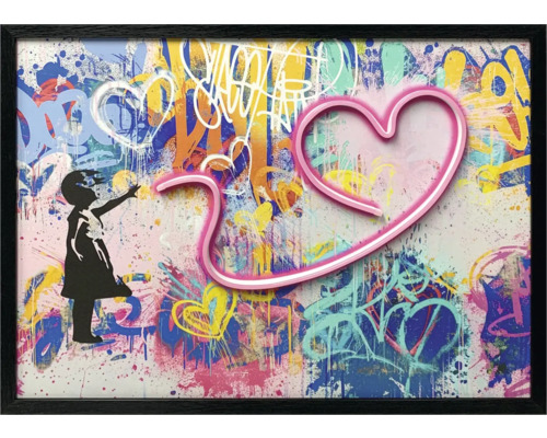 Inramad väggkonst med flickas silhuett och hjärtmotiv