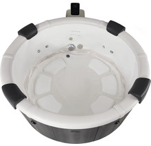 Rund bubbelpool med kontroller och säten