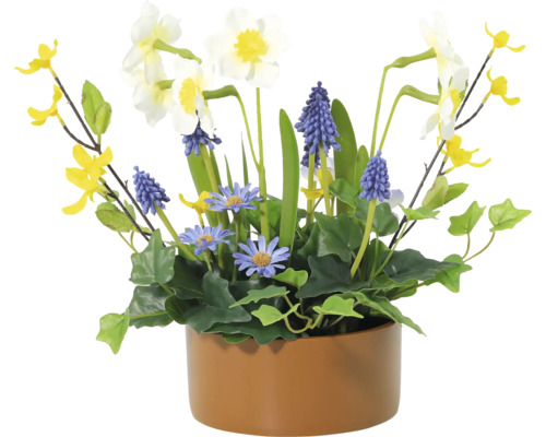 Konstgjord blomsterarrangemang med påskliljor, pärlhyacinter och prästkragar i en kruka