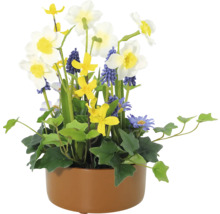 Arrangemang av konstgjorda blommor i kruka