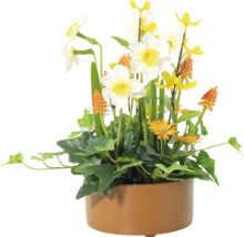 Konstgjord blomsterbukett med påskliljor i en kruka