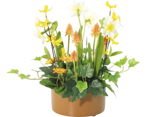 Dekorativa konstgjorda blommor i en kruka med påskliljor, ringblommor och gröna växter.