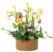 Dekorativa konstgjorda blommor i en kruka