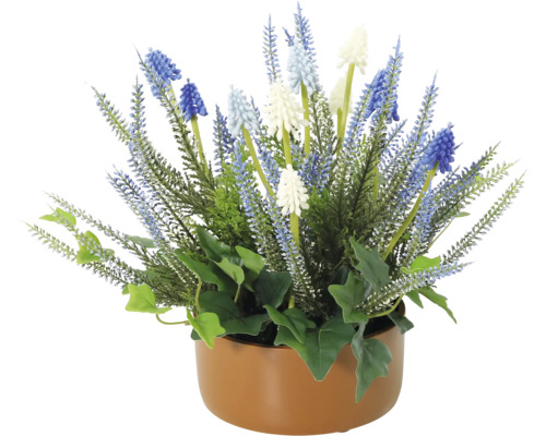 Dekorativa konstgjorda blommor i en kruka