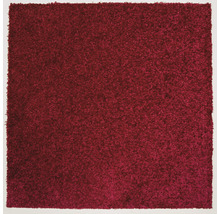 Detaljvy av en röd matta med öglad struktur