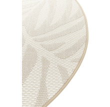 Detaljvy av en rund matta med vävd struktur