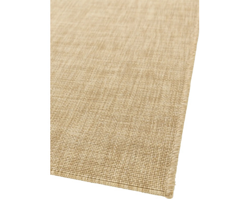 Beige matta av vävt material