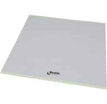Grå underlagsplatta från Bostik med gröna kanter och Bostik Logo.