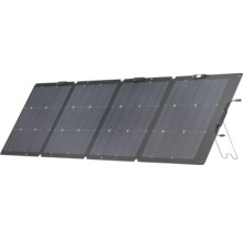 Vikbar solpanel med fyra moduler och integrerat stativ samt anslutningskablar.