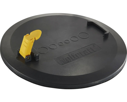 Rund svart plastplatta från Wolfcraft med gul klämspak, fast handtag, cirkulära markeringar och Wolfcraft Logo.