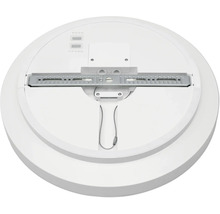 Baksida av en rund LED-taklampa med monteringsfäste i metall och säkerhetsvajer.