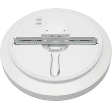 Baksida av en rund LED-taklampa med monteringsskena i metall, kopplingsdosa och säkerhetsvajer.