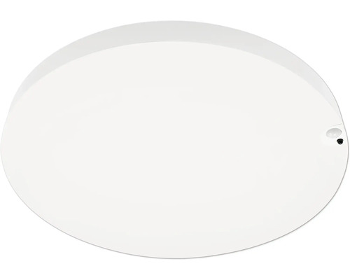 Rund vit vägg- och taklampa med integrerad rörelsevakt.