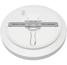 Baksidan av en rund taklampa med monteringsbygel i metall och säkerhetsvajer.