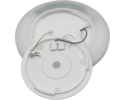 Baksida av en rund vit LED-panel med monteringsplatta, kablage och anslutningsplint.