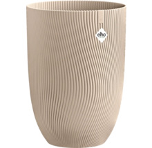 Hög rund blomkruka i beige plast med vågig ytstruktur och Elho Logo.