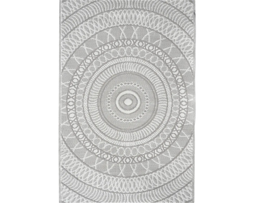 Utomhusmatta med cirkelformat mandalamönster och vävd struktur.