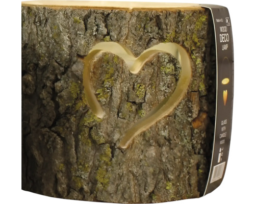 Dekorativ trälampa med hjärtformad utskärning av naturträ med bark.