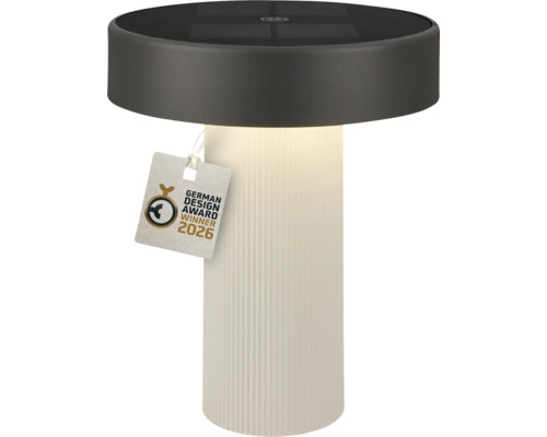 Cylindrisk solcellsbordslampa med räfflad vit bas och mörk ovandel, sigill German Design Award Winner 2026.