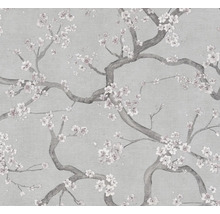 Strukturerad non-woven tapet med mönster av blommande grenar.