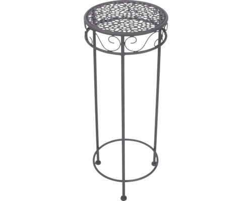 Rund blompall av metall med dekorativt hålmönster och ornament.