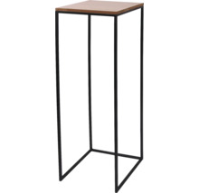 Modernt blombord med svart metallställ och träskiva.