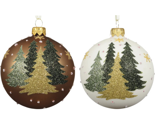 Två julkulor i glas med glittrande julgransmotiv och prickar, en brun och en vit.