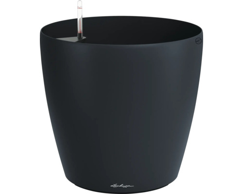 Rund planteringskruka i plast i svart med integrerat bevattningssystem och vattennivåmätare.