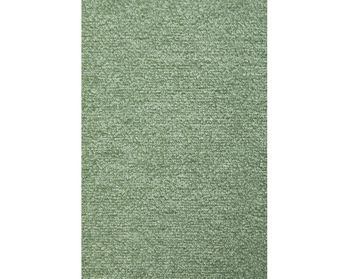 Närbild på en grön heltäckningsmatta med strukturerad yta.