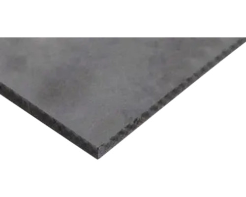Mörkgrå fibercementskiva med strukturerad yta i detaljvy.