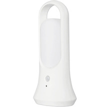 Bärbar LED-nattlampa i vit plast med rörelsesensor och bärhandtag.