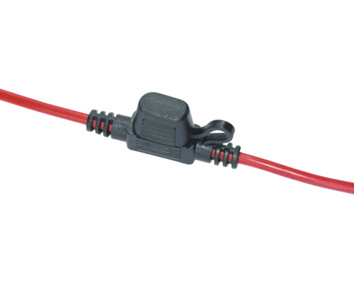 Stänkskyddad flatsäkringshållare med röd kabel och svart skyddslock.