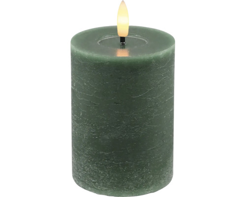 Grönt LED-blockljus med rustik yta och flamformat ljus.