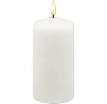 Vitt cylindriskt LED-blockljus med flamformat ljus.