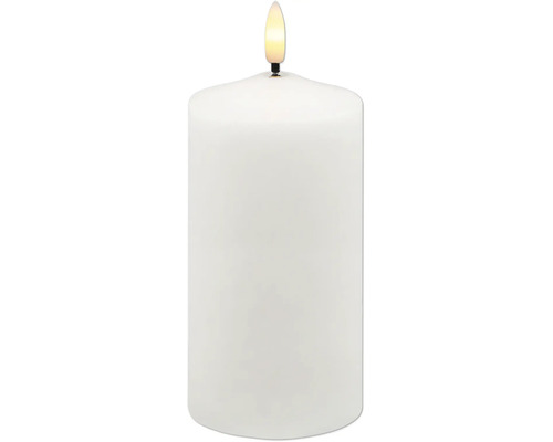 Vitt cylindriskt LED-blockljus med flamformat ljus.