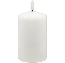Vitt LED-blockljus med konstgjord flamma av plast.